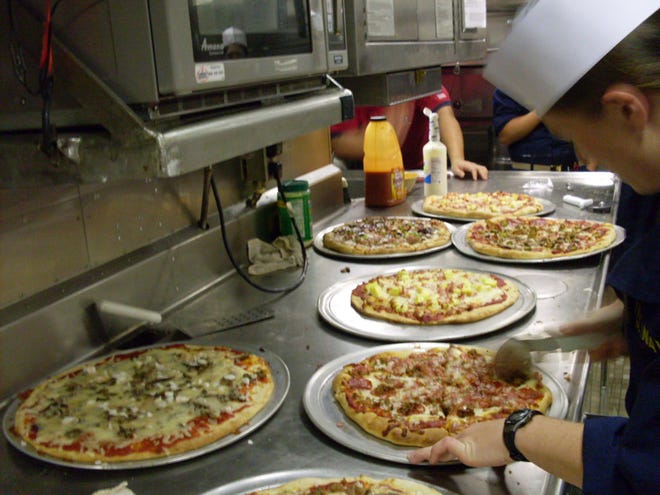 A Sailor
prepares pizzas in the galley onboard USS Maryland (SSBN 738).
