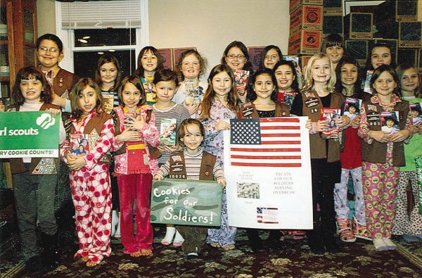 Submitted photo
COOKIE SHIPMENT: Girl Scouts from Acushnet, Fairhaven and New Bedford are sending Girl Scout cookies to troops overseas. Shown here in front form left are Julia Quintin, Shaylee Levasseur, Devyn Vieira, Taylor Gall, Abigail DaSilva, Shania Levasseur, Madison Medeiros, Riley Pimentel, Emma Boudreau, Emma Gonsalves, Madison Lowther and Vanessa Rogers. Second row: Alyssa Raposo, Rebekah Sojka, Cosette Bonneau, Olivia Dansereau, Rebecca Gall, Jillian Brodeur, Ashley Soares and Lauren Antao.