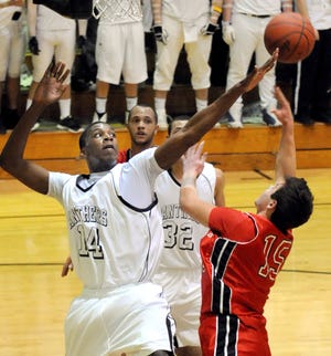 Perry's Dallas Harper blocks McKinley's Reid Worstell during the Panthers' 42-39 victory Friday at Perry High School.