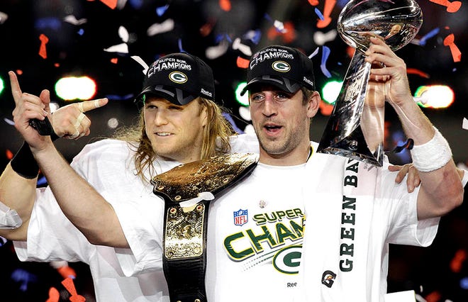 Green Bay Packers' Aaron Rodgers, right, poses with teammate Green Bay Packers' Clay Matthews after the NFL football Super Bowl XLV game against the Pittsburgh Steelers Sunday, Feb. 6, 2011, in Arlington, Texas. The Packers won the game 31-25. (AP Photo/Chris O'Meara)