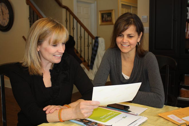 Lisa Buccella, left, of Franklin, and Maria Flannery of Hopkinton, plan a bone marrow drive and organ donor awareness program on Feb. 12 at the YMCA in Franklin.