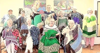 The Allegro knitting group includes front row, from left: Dot H., Eukie C., Jo W., Deelee S. Second row: Vivian C., Jentry C., Maggie F., Joe F., Billie F., Henry D. and Connie K. Contributed photo