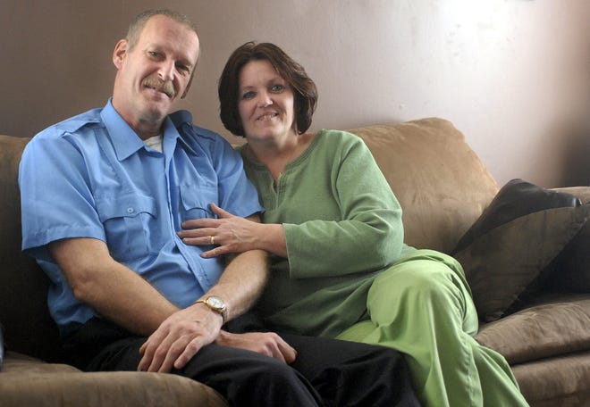 Mark Larson, 53, and wife Julie Larson, 51, who met through an online chatroom as friends and later fell in love, Tuesday, February 8, 2011 in Oriskany Falls.