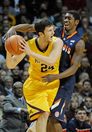 In this file photo, Minnesota's Blake Hoffarber looks for assistance as Illinois' Brandon Paul defends during the first half of an NCAA college basketball game Thursday, Feb. 10, in Minneapolis.