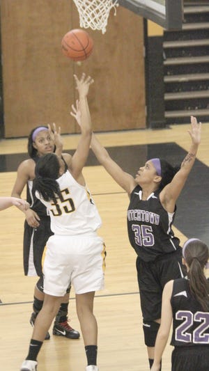 Dutchtown’s Brelle Ford defends St. Amant’s Kayla Ruth. Dutchtown finished ninth in the Class 5A power rankings.