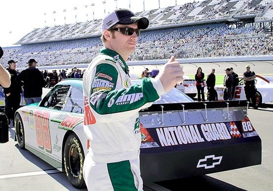 NASCAR driver Dale Earnhardt Jr. stands behind his car after his qualifying run for the Daytona 500 Saturday at Daytona International Speedway. By TERRY RENNA, The Associated Press