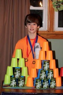 Jack Arnold with his awards from the stacking competition.