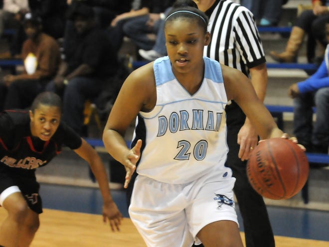 Terrika Foster (20) scored eight points Tuesday night as Dorman cruised to a 65-39 win over Wren in the first round of the 4A state playoffs.