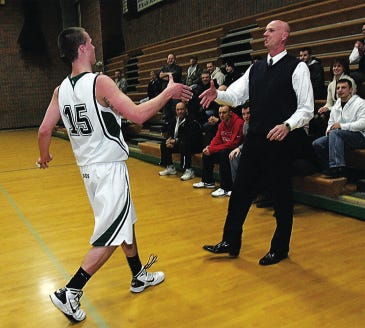 Photo by Daniel Freel/New Jersey Herald 
 
Hopatcong’s Matt Tobin, left, goes to shake the hand of his father, Dennis, after scoring his 2,093rd point during the second quarter against Wallkill Valley on Tuesday in Hopatcong, cementing a new school record.  Dennis held the previous school record.