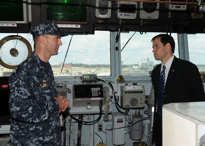USS The Sullivans' (DDG 68) Commanding Officer, Cmdr. Mark Olson, explains the ship's operations on the bridge to U.S. Senator for Florida during a tour of the. Rubio's visit included brief tour of the base to discuss future homeport plans and strategic operations for the base as well as a tour and lunch aboard USS The Sullivans (DDG-68).