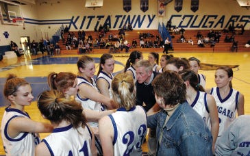Photo by Daniel Freel/New Jersey Herald 
 
Kittatinny players gather around head coach Andy Meyers, center, before the start of the second half against North Warren Thursday in Hampton. The Cougars won, 47-39.
