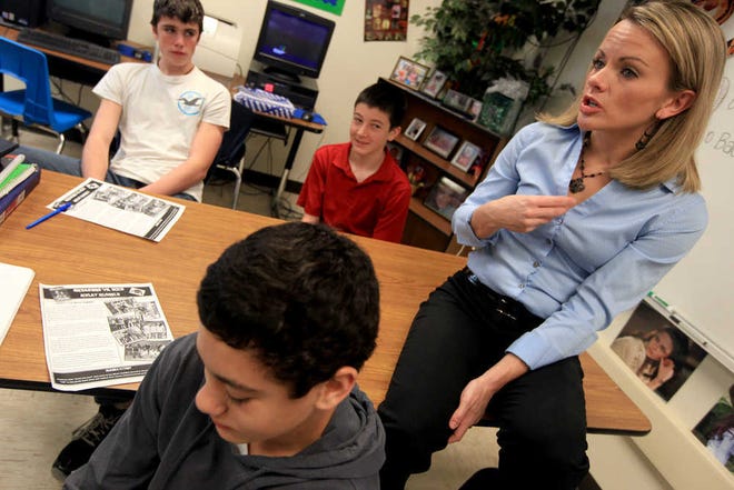 Teacher Lenzi Hart speaks to her eighth-grade reading class at Frenship Middle School in Wolfforth on Wednesday