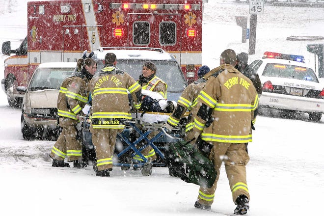 Heavy afternoon snowfall was the probable cause of a three-vehicle mishap at Perry Drive and Third Street Northwest around 2:30 p.m. Three people were transported to Aultman Hospital with what was believed to be minor injuries.