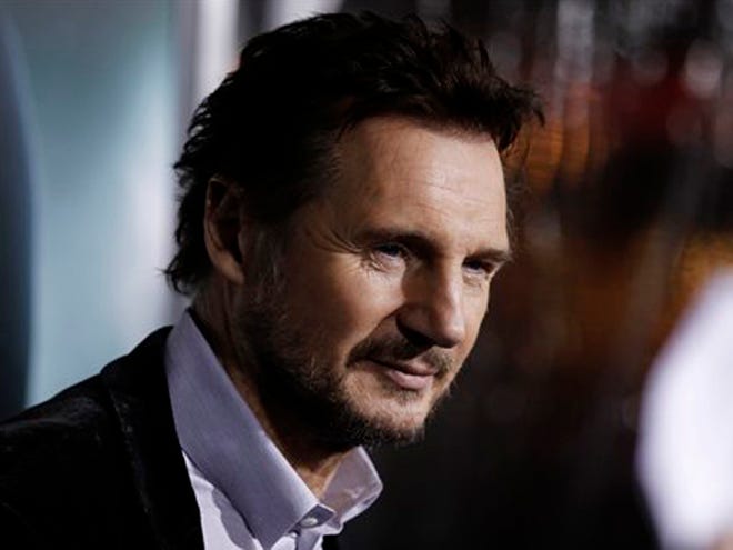 Liam Neeson arrives at the premiere of "Unknown" on Wednesday in Los Angeles.