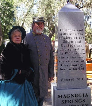 Civil War re-enactors representing the North and the South joined forces for the rededication of Magnolia Springs Cemetery. The cemetery is the final resting place for at 10 Civil War soldiers.