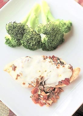 Crusted Chicken Scallopine with Rustic Tomato Sauce is a healthier take on chicken parmesan. By TRACY A. WOODWARD, The Washington Post