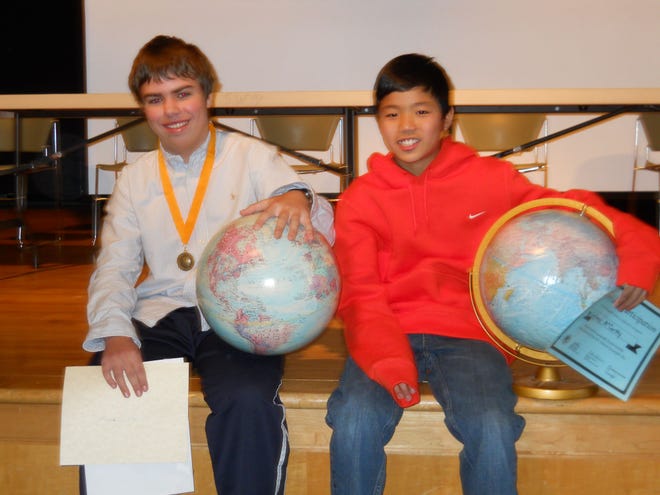 The winner and runner-up of the recent NMS geography bee are Garrett Pickard, at left, and Johnny McCarthy.