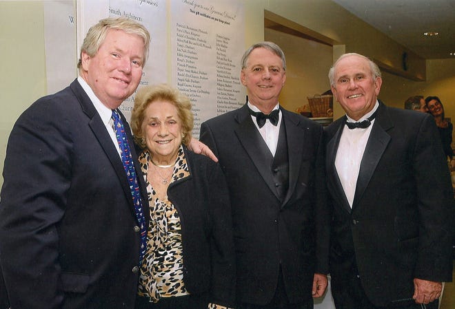 Rita Welch, founder of Welch Healthcare & Retirement Group enjoys an elegant evening of Black Tie Bingo with, from left to right, Shawn Dahlen, Duxbury Chairman of the Board of Selectmen, Duxbury resident, attorney Peter N. Muncey and Duxbury resident and master of ceremonies, Jim Fagan.