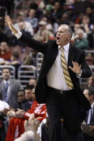 Sixers' coach Doug Collins yells to his team during Wednesday's win over the Wizards. (AP Photo/Matt Slocum)