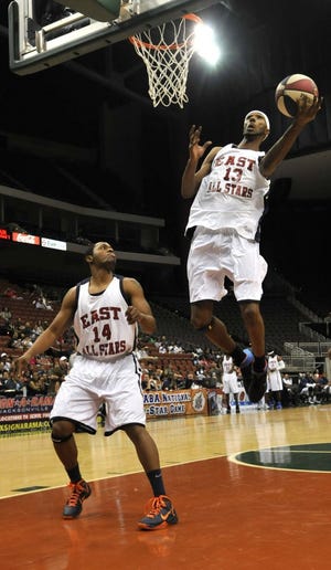 The East's Jermaine Bell, from the Jacksonville Giants, goes up for a basket in the first half of the ABA All-Star basketball game at the Jacksonville Veterans Memorial Arena on Saturday. For a gallery of photos from the game, go to Jacksonville.com.