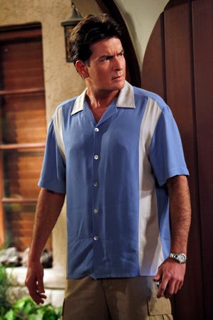 In this file image released by CBS, Charlie Sheen is shown in a scene from the CBS comedy, "Two and a Half Men." Sheen is looking at a future without "Two and a Half Men." Sheen's desire to exit the sitcom was reported by People magazine online Thursday April 1, 2010.