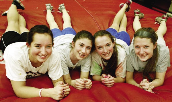 Old Rochester girls relay team members, left to right, Hannah Walsh, Morgan DaSilva, Ally Saccone and Therese Morss.