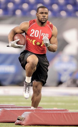 Alabama running back Mark Ingram runs a drill at the NFL scouting combine in Indianapolis. The Associated Press
