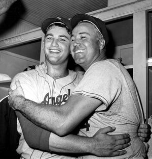 In this Oct. 8, 1959 file photo, Los Angeles Dodgers pitcher Larry Sherry, left, and center fielder Duke Snider embrace in the dressing room after the Dodgers defeated the Chicago White Sox to win the World Series at Comiskey Park in Chicago. Snider, 84, died early Sunday of what the family called natural causes at the Valle Vista Convalescent Hospital in Escondido, Calif. Snider was part of the charmed "Boys of Summer" with the Dodgers in the late 1940s and 1950s. He helped lead Brooklyn to its only World Series championship in 1955. AP Photo