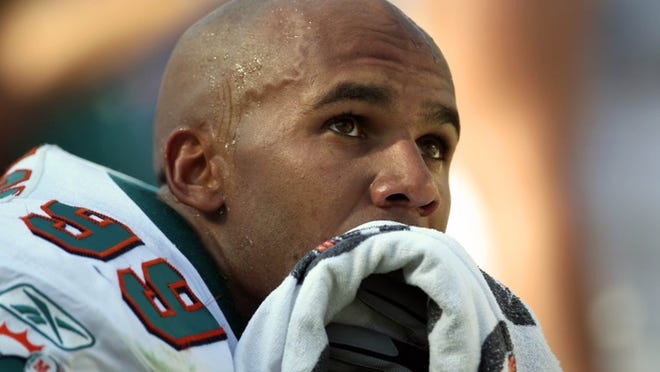 Jason Taylor, shown while with the Dolphins near the end of the 2009 season, has been cut by the New York Jets.
