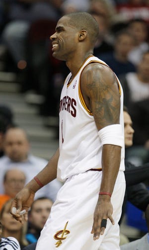 Cleveland Cavaliers' Antawn Jamison leaves during the third quarter of Sunday's 95-91 loss to the Philadelphia 76ers with a finger injury.