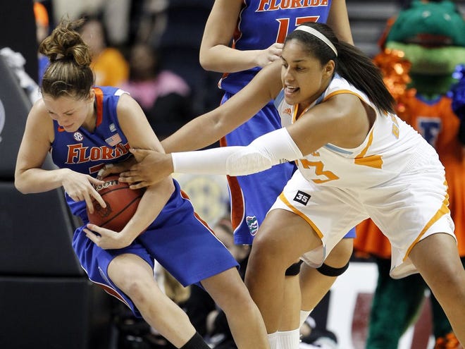 Tennessee forward Alyssia Brewer, right, fouls Florida guard Jordan Jones, left, as Brewer tries to steal the ball in the first half of an NCAA college basketball game at the Southeastern Conference tournament on Friday, March 4, 2011, in Nashville, Tenn. (AP Photo/Mark Humphrey)