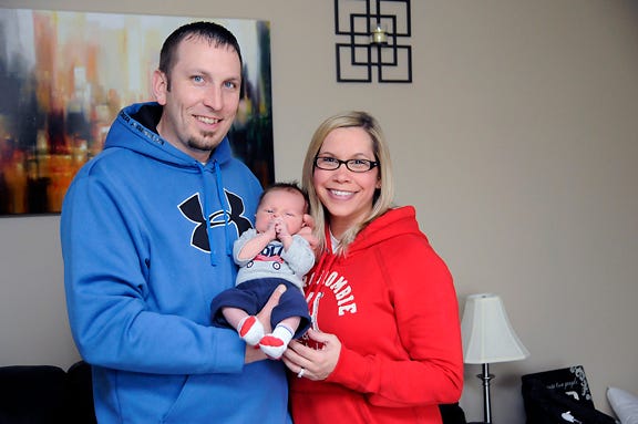 Mike and Shana Gettel hold their son, Drake, who was the 100th child born at Bixby Medical Center this year. Drake was born Feb. 16. Bixby is now the only choice for women who want to give birth in a hospital in Lenawee County.