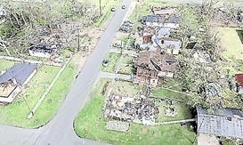 This aerial photo provided on Sunday by the Rayne Police Department shows damage from Saturday's tornado that killed one and injured several others in Rayne, La. AP Photo/Rayne Police Department
