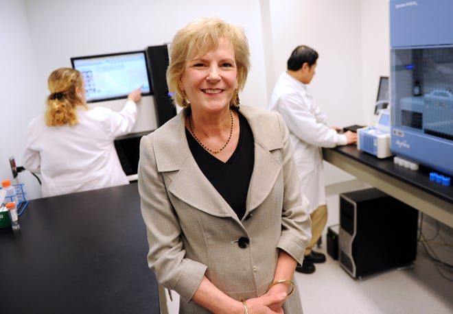 Thanks to new equipment, Dr. Lesleyann Hawthorn's team can sequence a person's entire genome in 10 days for about $10,000.