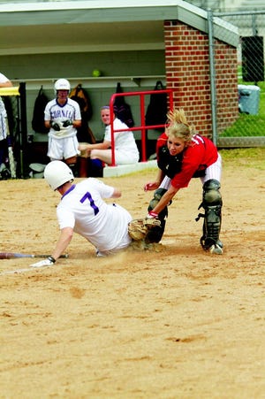A Scots catcher makes a play at the plate in 2010.