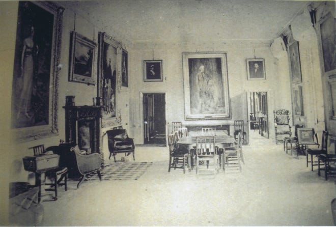 This historical photo shows the inside of the banquet room at Castle Menzies in Weem, Perthshire, Scotland.