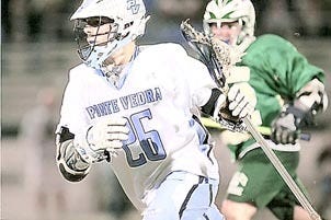 Ponte Vedra lacrosse defender Marcus Dunlap runs with the ball during Tuesday's 19-1 win over Fleming Island. Dunlap won five of his seven faceoffs. By LYNN DAMM, Special to The Record