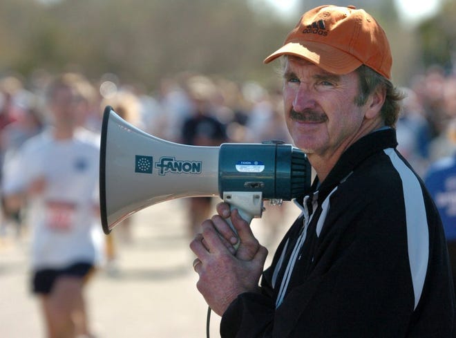 Race director Doug Alred keeps watch over the finish line during the 2005 Gate River Run.