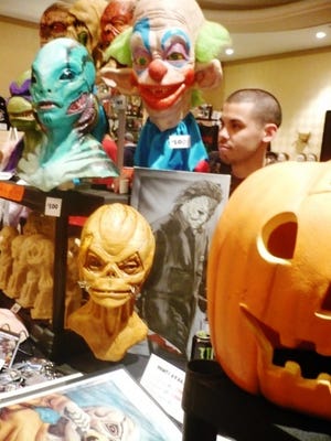 Brian Dunn of Newark, Del., showcases his ghoulish creations at Monster Mania Con 17, held this weekend at the Crowne Plaza in Cherry Hill.