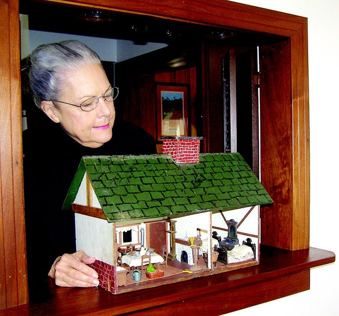 Julie Craig will soon part with a dollhouse she has owned for 20 years. She offered it to the Besore Capital Campaign Committee to auction at a fundraiser next week.