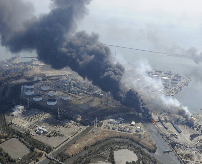 Thick smoke billows from an industrial facility in Kamaishi, northeastern Japan, today, two days after a giant quake and tsunami struck the country's northeastern coast.