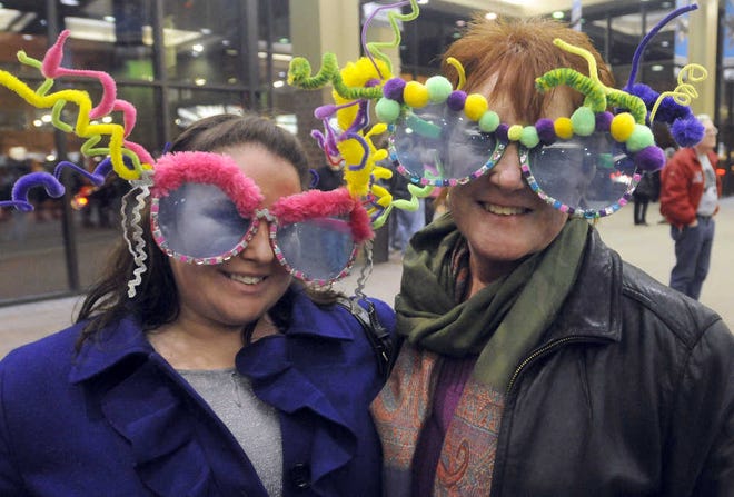 Sharon L. Thompson of Falmouth, left, and her daughter, Serena Fackos of Pawcatuck, Conn. were among the fans attending last night’s Elton John show at the DCU Center.