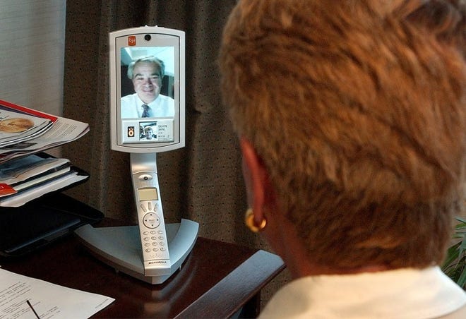 FILE PHOTO. Former CEO of WorldGate Communications, Hal Krisbergh, appears on the Ojo video phone. The company said Monday it's running short on cash and is exploring strategic alternatives. 
Kim Weimer/photo 7/1/04