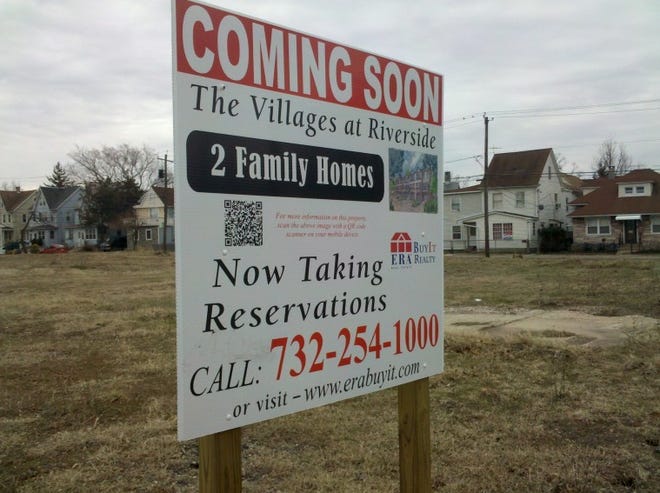 A sign shows that new homes are slated to be built on Clay Street in Riverside later this year. The site is being developed by the Teicher Organization in East Brunswick.