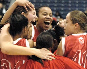 Members of the Rancocas Valley girls basketball team celebrate their state title win over Paterson Kennedy on Sunday in Toms River. It was the first state title for the girls program. The R.V. and Burlington Township boys both lost in their state title bids Sunday in Piscataway.