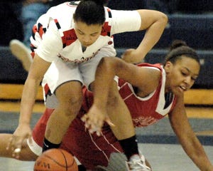 Rancocas Valley's Lauren Moses and a Paterson Kennedy player battle for the ball during the NJSIAA Group 4 championship.