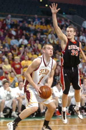 Cardinal Spellman's Joe Glynn, left, looks for room to shoot against Watertown defender Danny Kelly in the third quarter of the Cardinals' 56-36 loss on Tuesday, March 15, 2011, in the Div. 3 state semifinal at TD Garden.