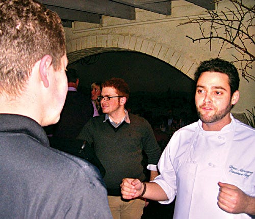 James is greeted by Pineville Tavern executive chef Drew Abruzzese during the restaurant's big night on TV.