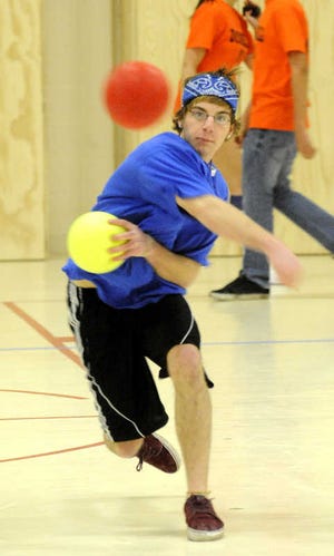 A player keeps the balls flying at Shepherd Hill Regional High School’s dodgeball tournament.