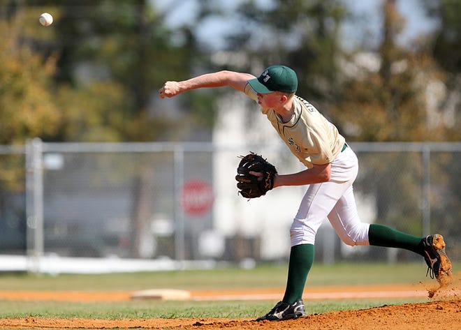 St. Joseph Academy's Brian Stecker delivers a pitch during Friday's win over Beacon of Hope Christian.